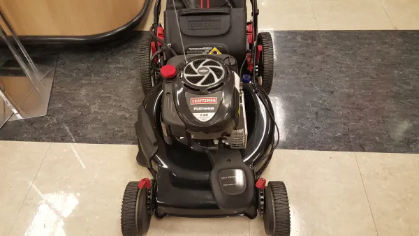 Petrol lawn mower